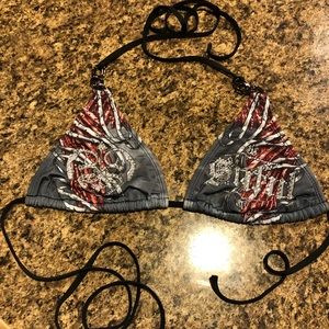 Sinful swim top. From the buckle.